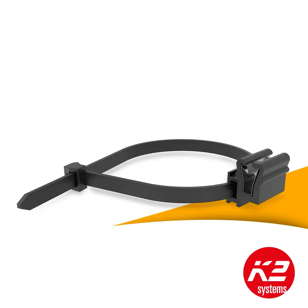 K2 Cable Manager PA66W kabelhouder kopen bij solago.nl, kabelmanagement voor zonnepanelen op witte achtergrond met oranje podium productfoto